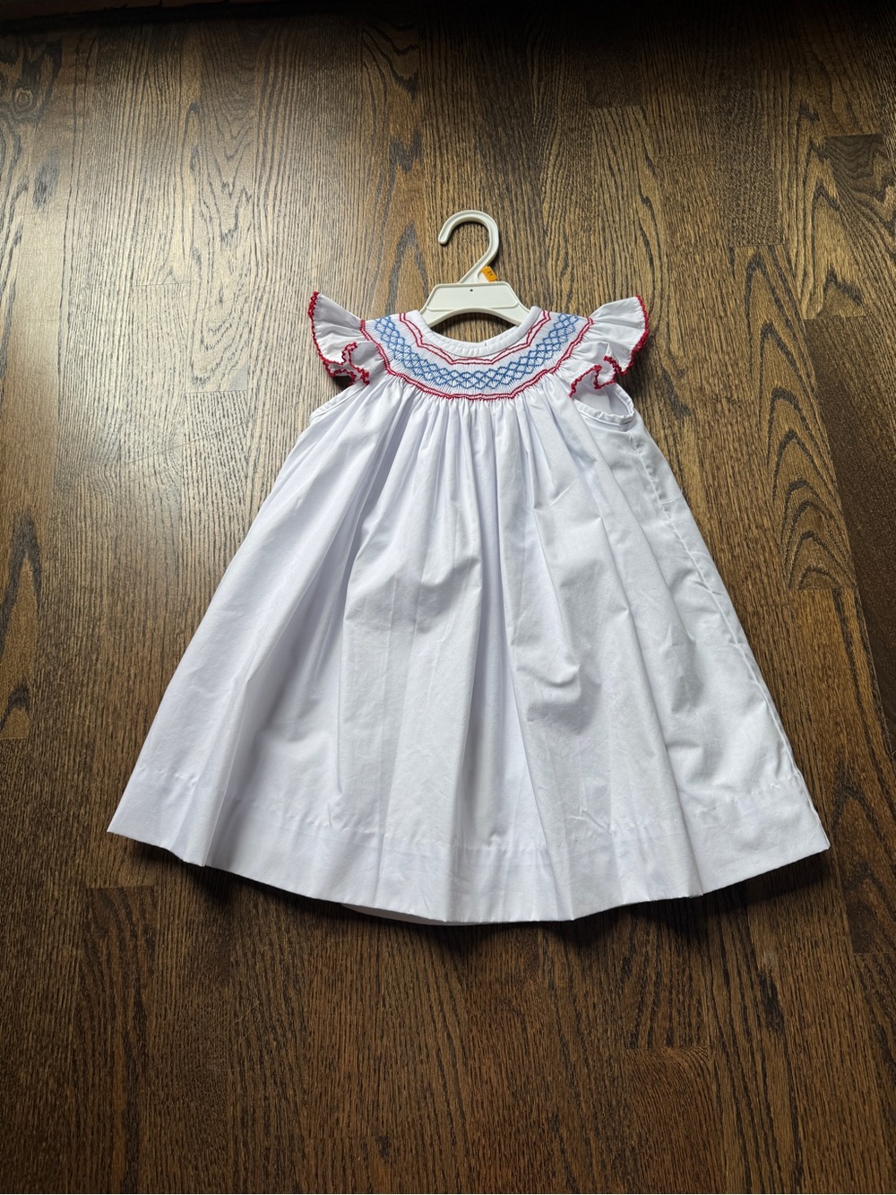 The Beaufort Bonnet Company White Dress with Red & Blue Smocking